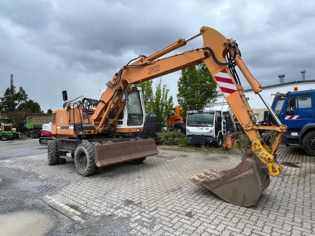 Wheel excavator LIEBHERR A Bagger 312 Deutsch Top LIEBHERR A Bagger 312 Deutsch Top- Photo 2