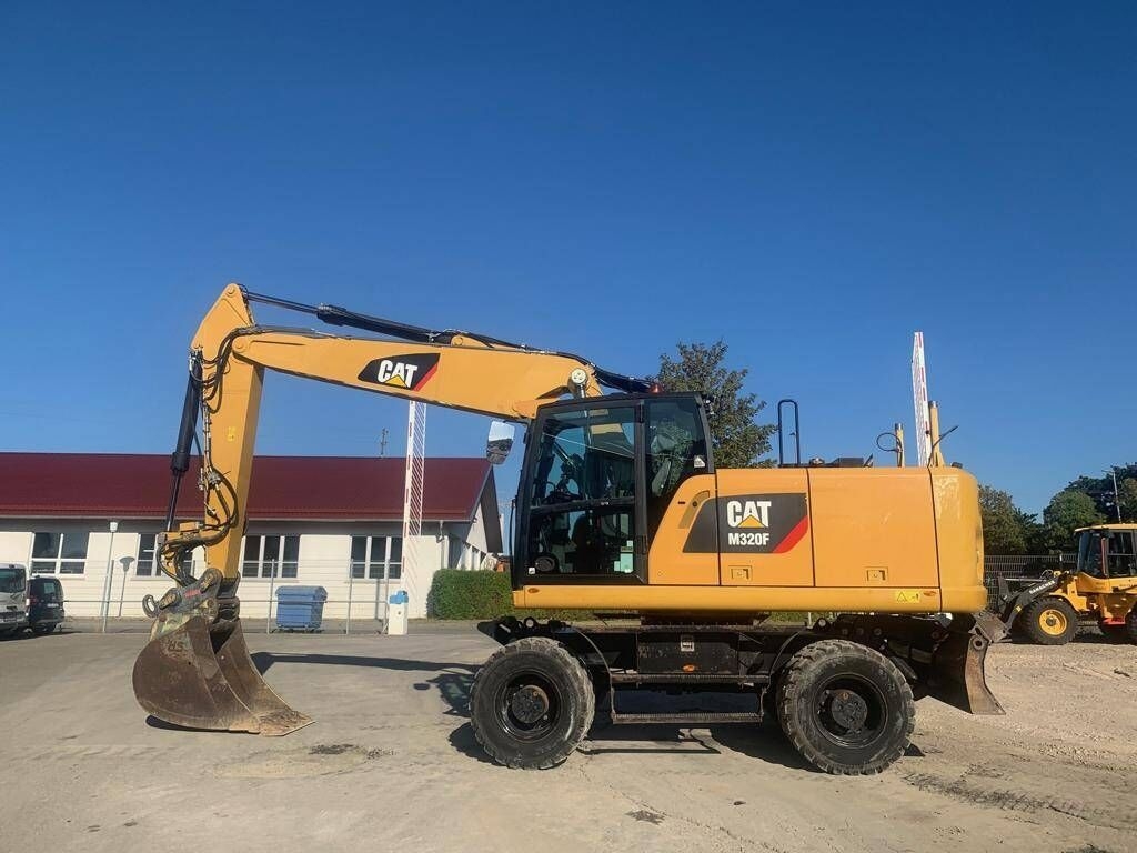 Wheel excavator CAT M320F- Photo 2