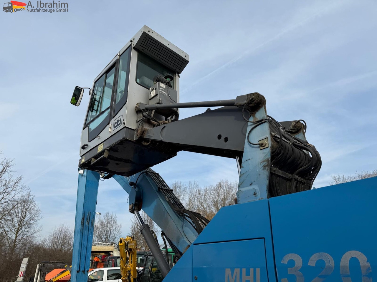 Mobilbagger MHL 320 Umschlagbagger Generator Hubkabine MHL 320 Umschlagbagger Generator Hubkabine- Photo 3