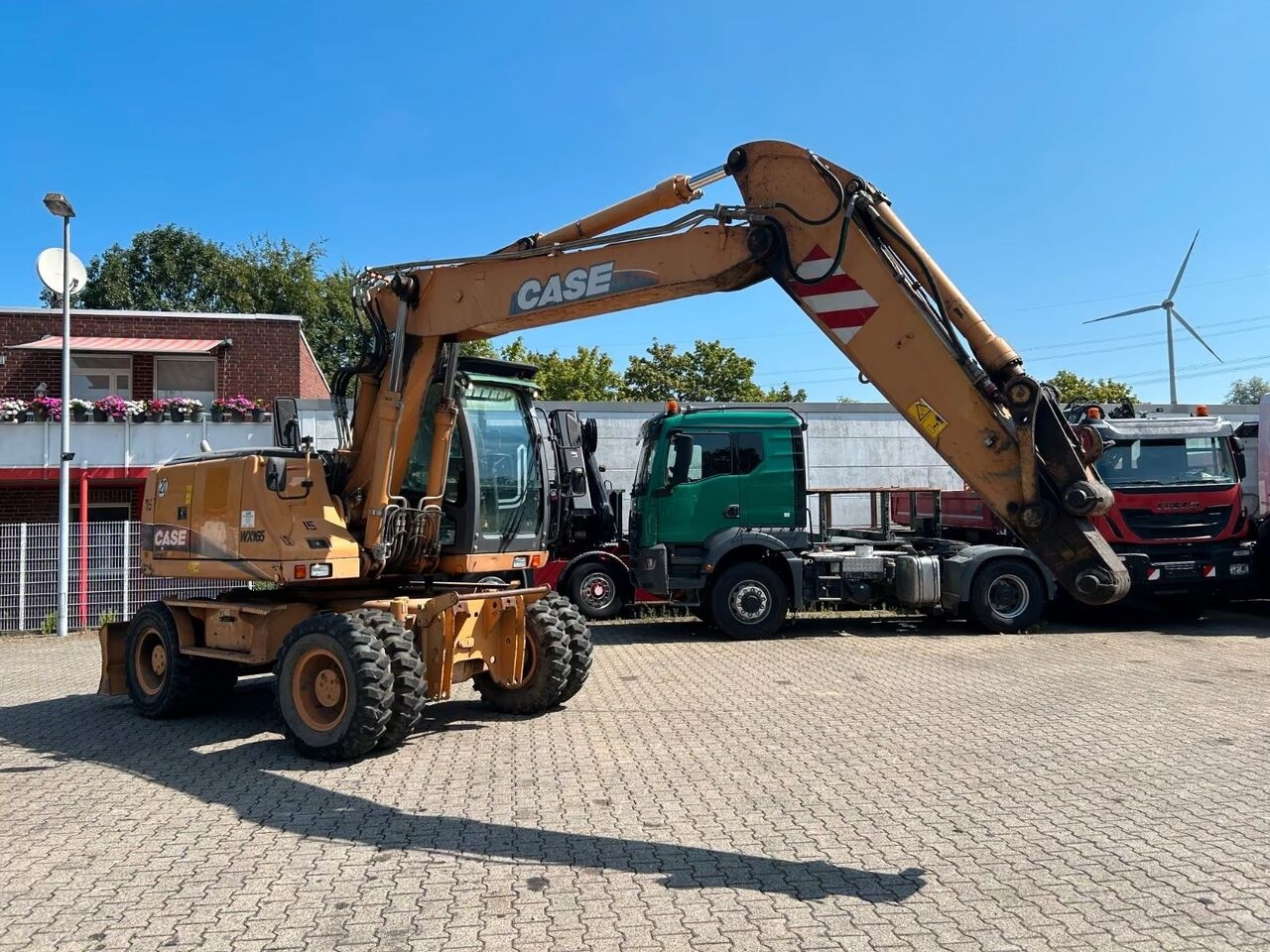 Wheel excavator Case Mobilbagger WX165- Photo 2