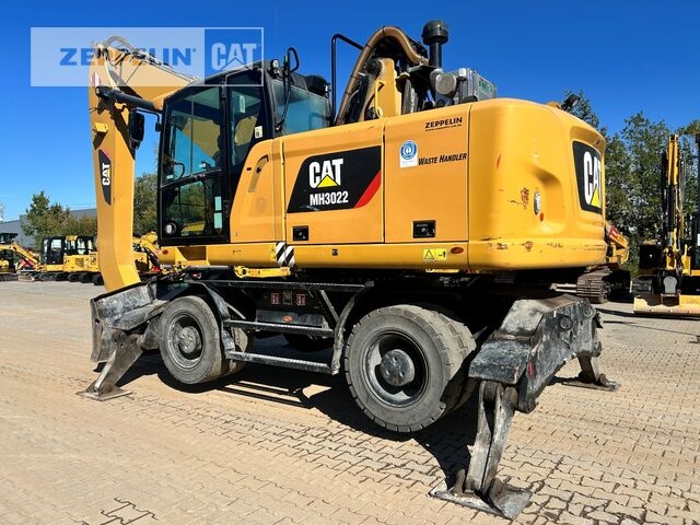 Pelle de manutention Cat MH3022-06C- Photo 2