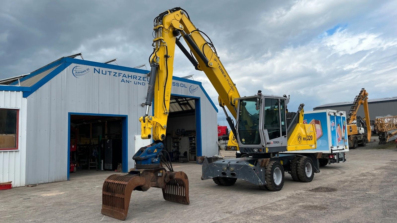Overslagkraan Fuchs TeRex MHL 320 D Umschlagbagger Greifer Pratzen Fuchs TeRex MHL 320 D Umschlagbagger Greifer Pratzen- Photo 3