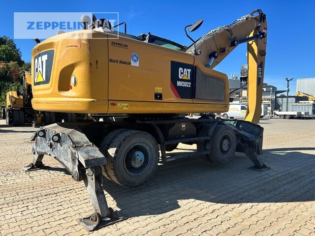 Pelle de manutention Cat MH3022-06C- Photo 3