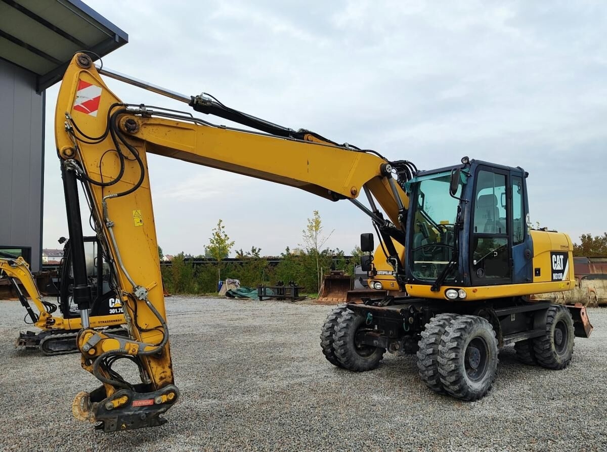 Mobilbagger Caterpillar M313D- Photo 2