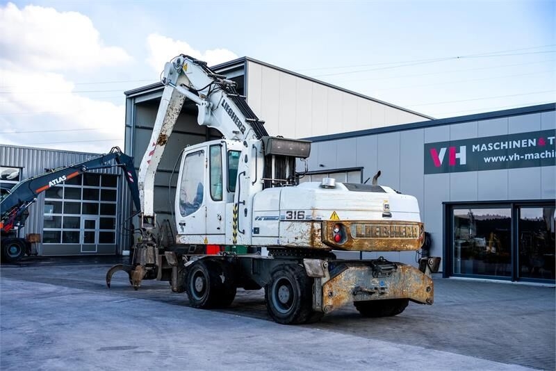 Umschlagbagger Liebherr A 316 Litronic- Photo 2