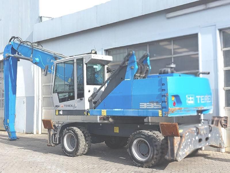 Pelle de manutention- Photo 3