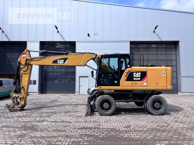 Pelle sur pneus M320F M320F- Photo 2