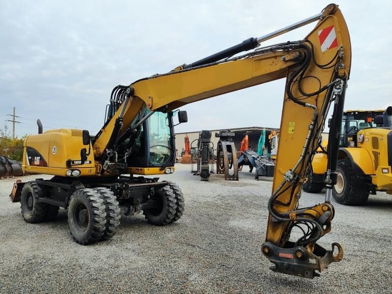 Mobilbagger Caterpillar M313D- Photo 3