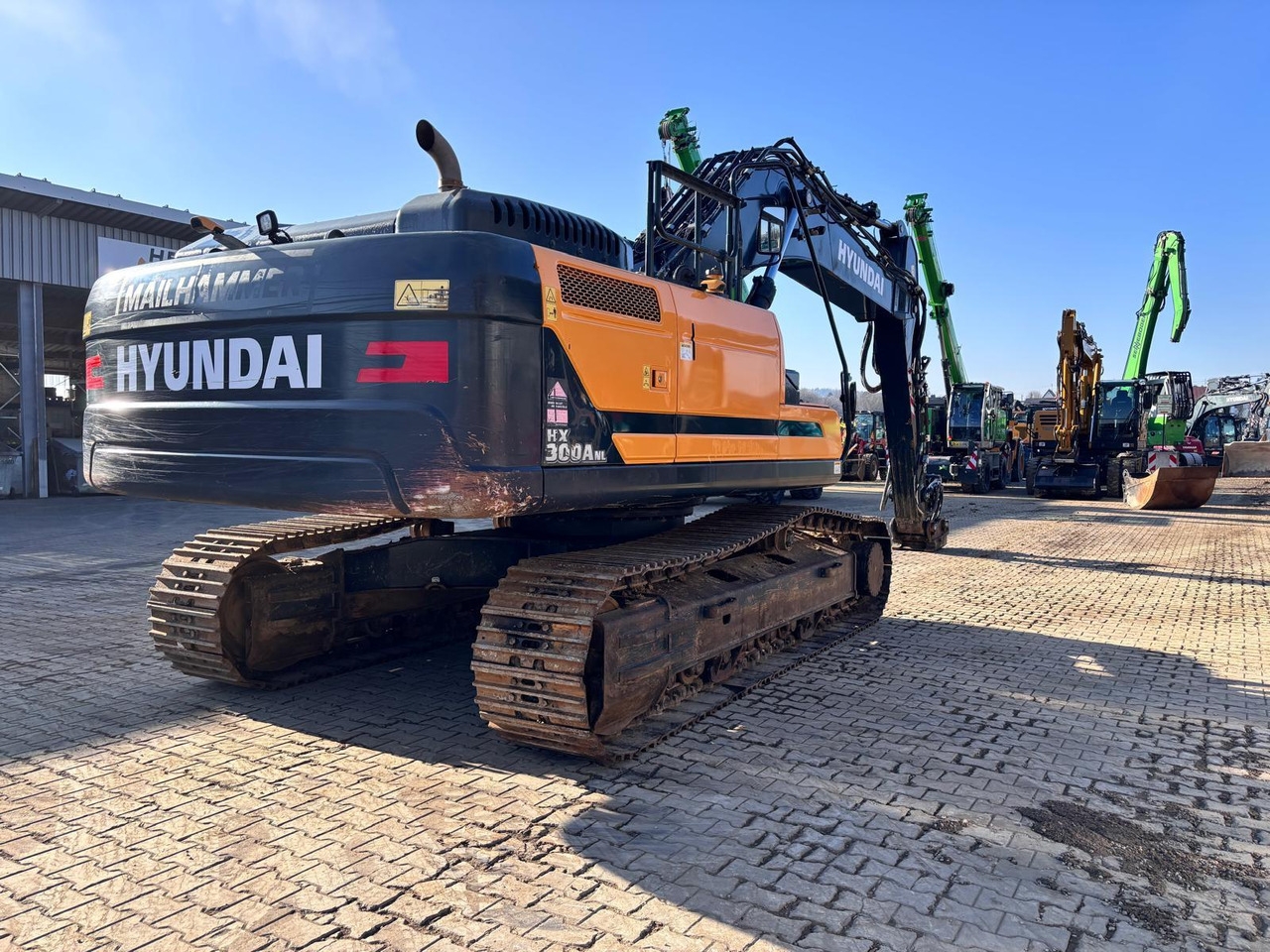 Pelle sur chenille Hyundai HX300ANL Hyundai HX300ANL- Photo 2