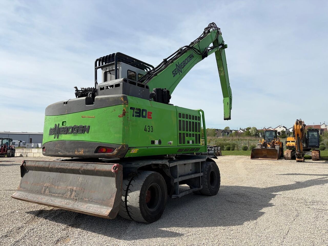 Pelle sur pneus Sennebogen 730E Sennebogen 730E- Photo 3